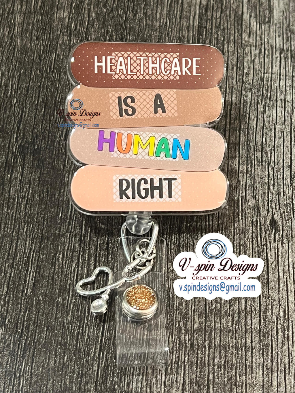 "Healthcare Is A Human Right" Badge Reel | Band-Aid Acrylic Retractable ID Holder