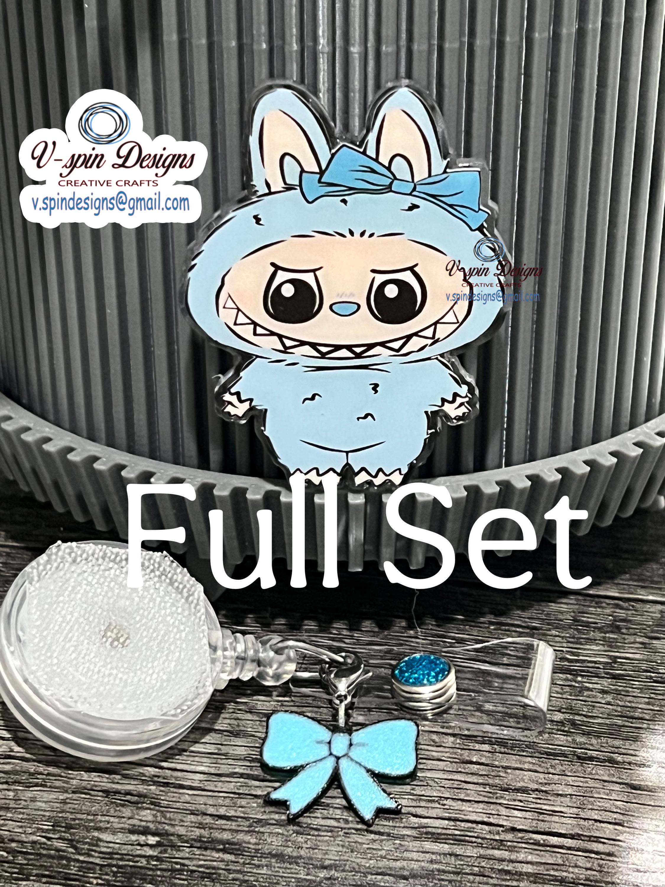 Cute light blue little Standing Monster with bow/nurse badge reels